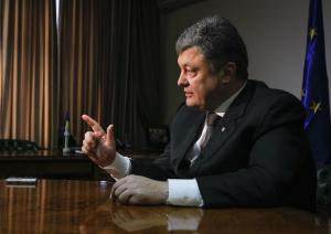Petro Poroshenko gestures during an interview with Reuters in Kiev